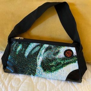 Unique handbag made from reclaimed billboard vinyl